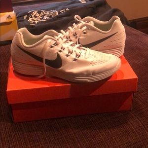 White Nike running shoes